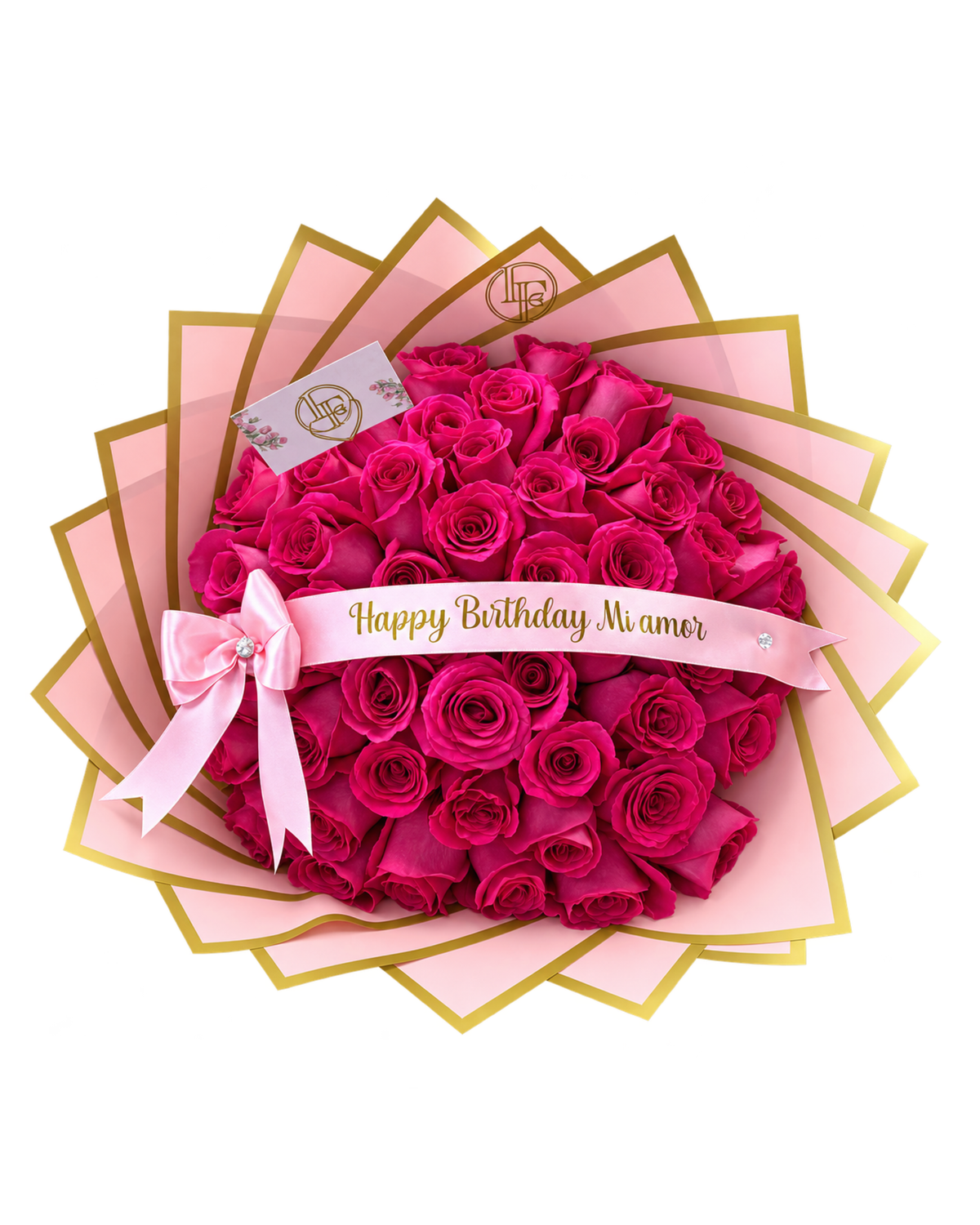 A heart-shaped bouquet of vibrant magenta pink roses wrapped in layered pink paper with gold edges, tied with a pink ribbon that reads 'Happy Birthday Mi amor' on a white background.