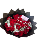 Bouquet of red roses with white berries in black paper wrapping, featuring a card on a white background.