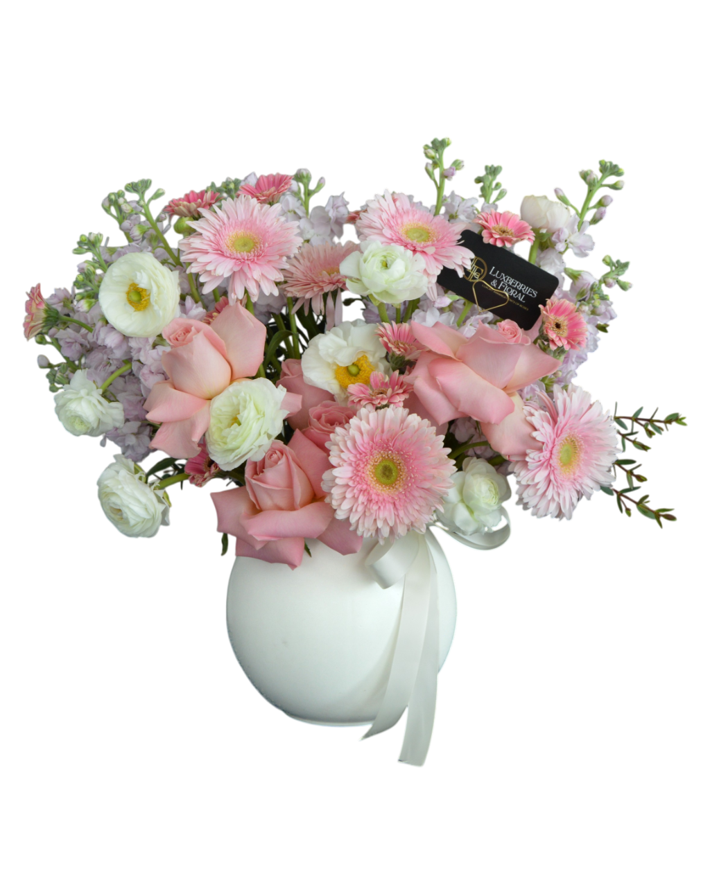 Bouquet of pink and white flowers in a white vase on a white background