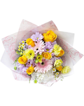 Bouquet of flowers wrapped in cellophane with decorative paper on a white background