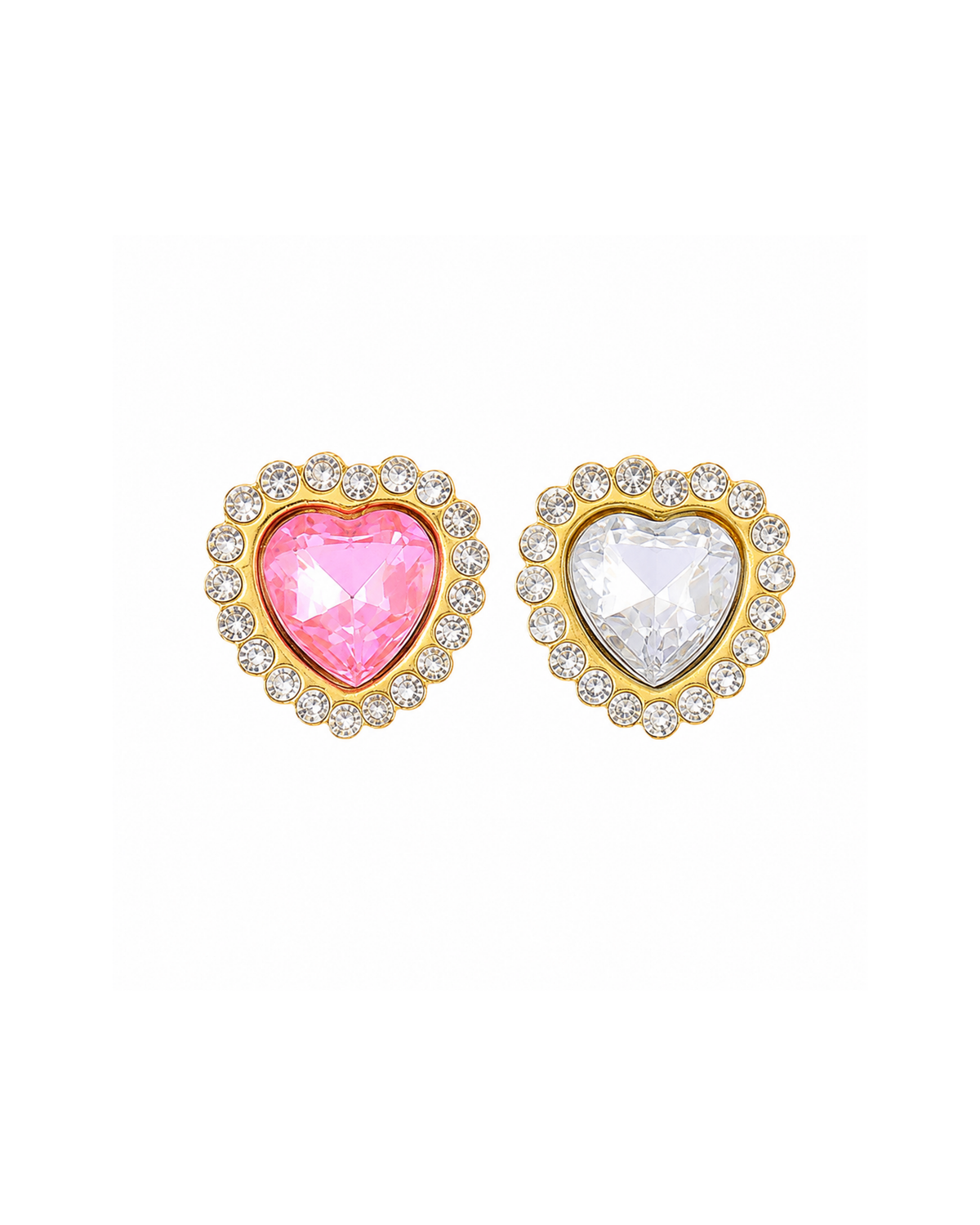 A pair of gold heart-shaped stud earrings, one featuring a pink heart-shaped crystal and the other a clear heart-shaped crystal, both surrounded by a halo of small clear crystals, set against a plain white background.