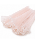 A light pink tulle tutu skirt with delicate white pearl bead trim along the ruffled edge, displayed on a clean white background.