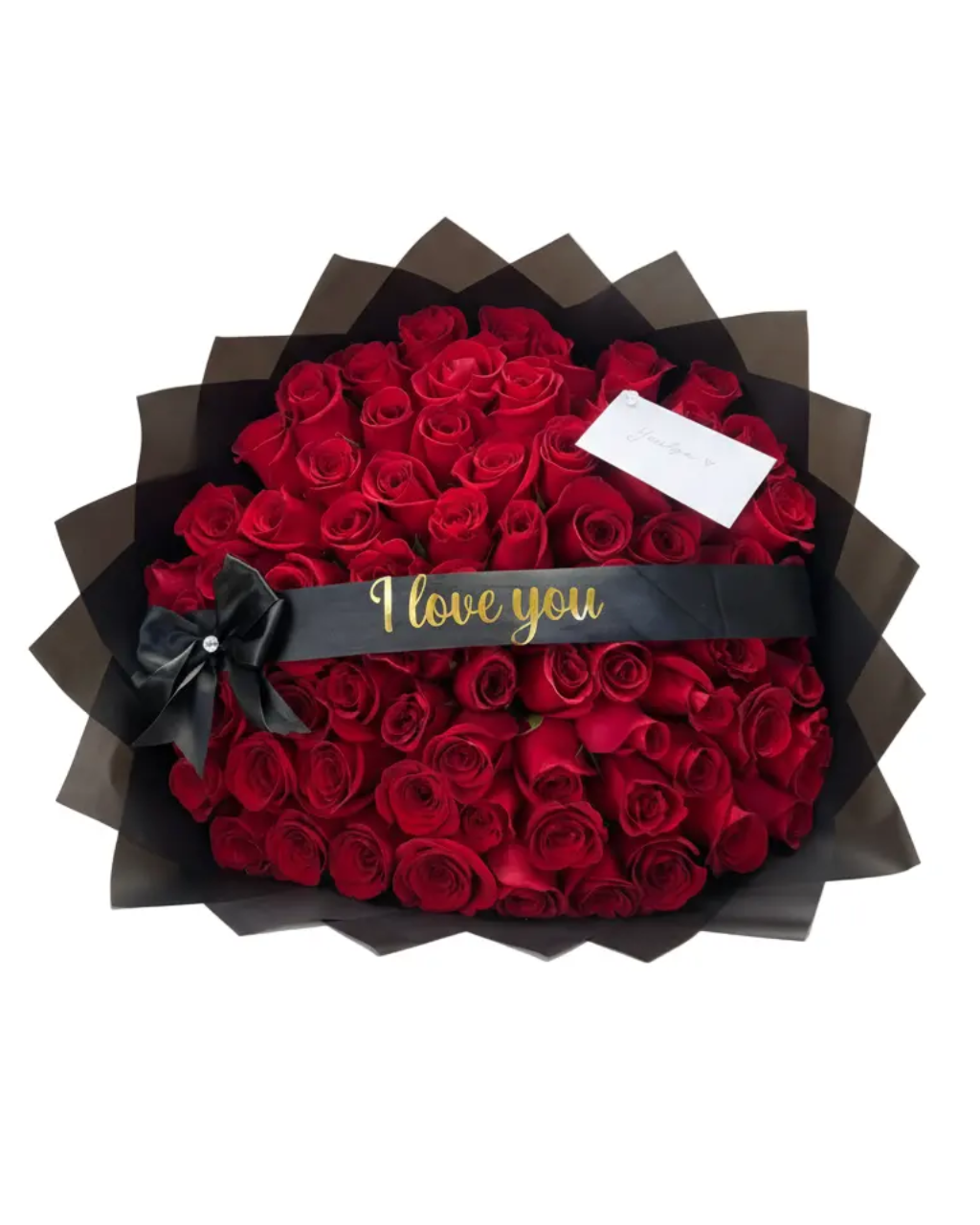 Heart-shaped arrangement of red roses with a black bow and 'I love you' message on a white background
