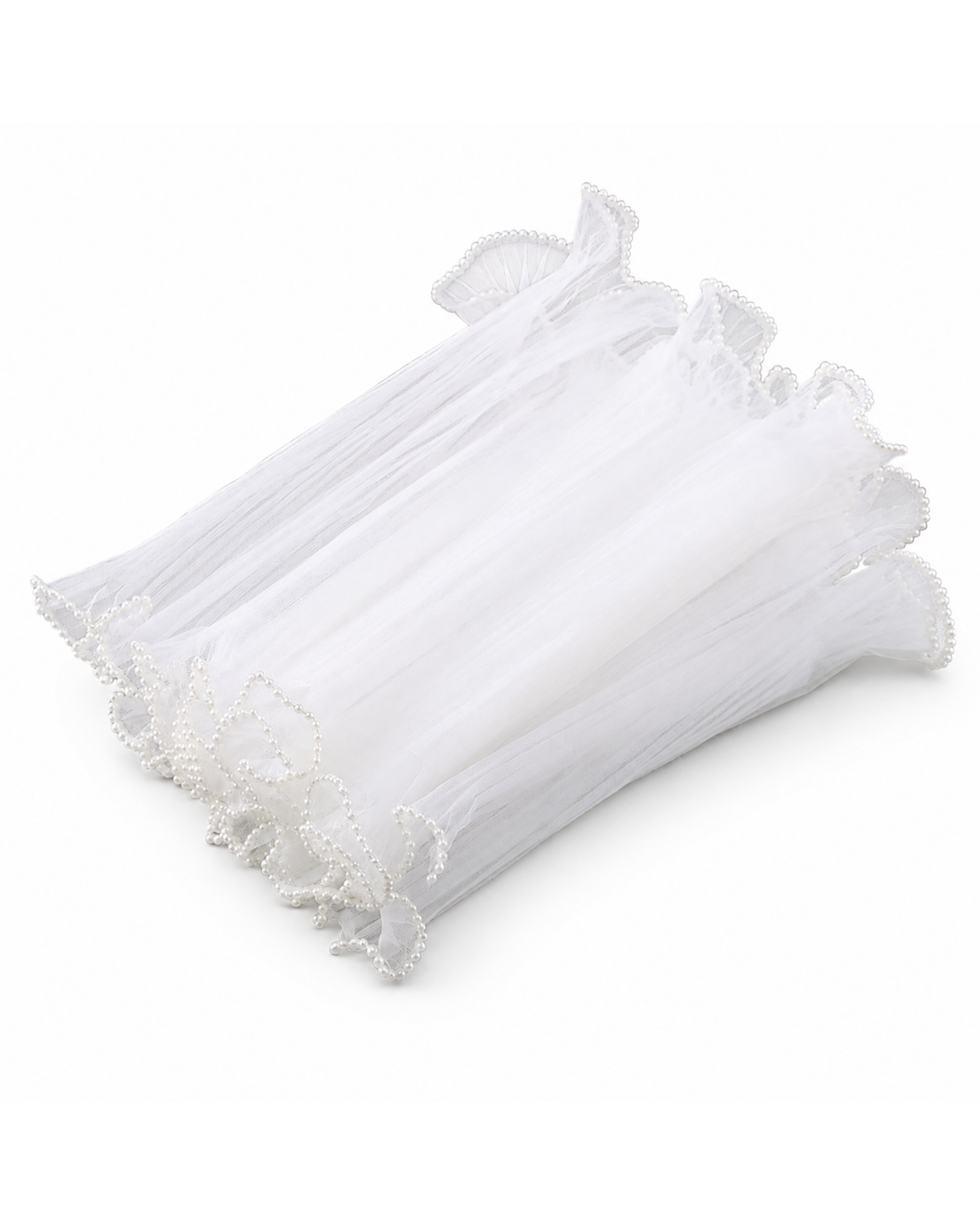 A bundle of white sheer mesh ruffled fabric with delicate lace trim, photographed on a clean white background.